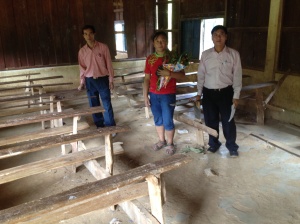 Chipseng with the Headteachers of Pak Xeng School in a typical classroom